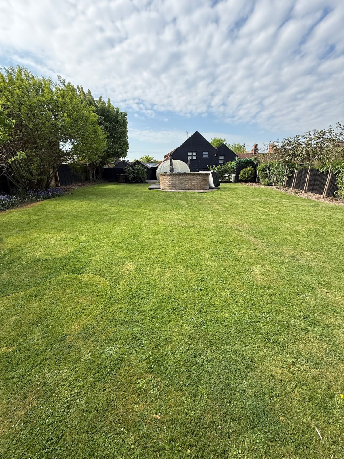 Large private lawn with the outdoor bar and garden igloo