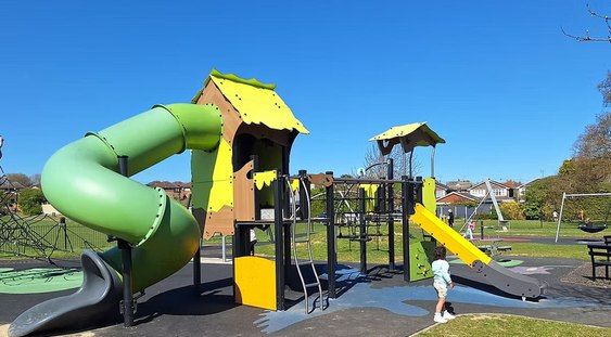 Baddow Hall Park playground with green spiral slide