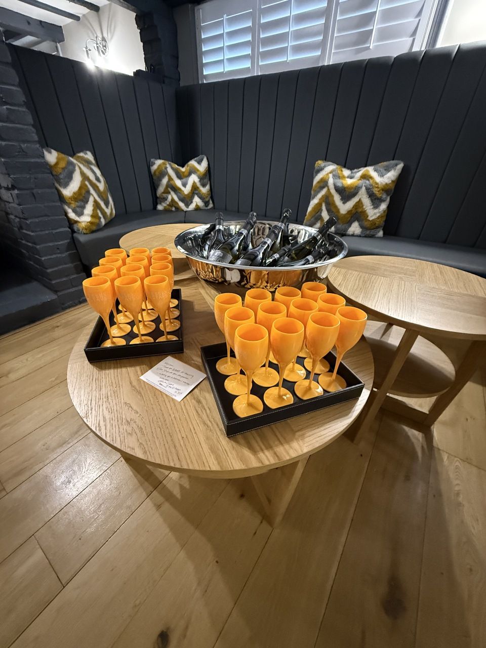 Welcome bubbles on ice with orange Essex Stays flutes
